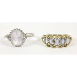 A 9ct white gold milky quartz and white stone cluster ring, and a gold five stone marquise cut