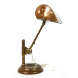 A copper desk lamp