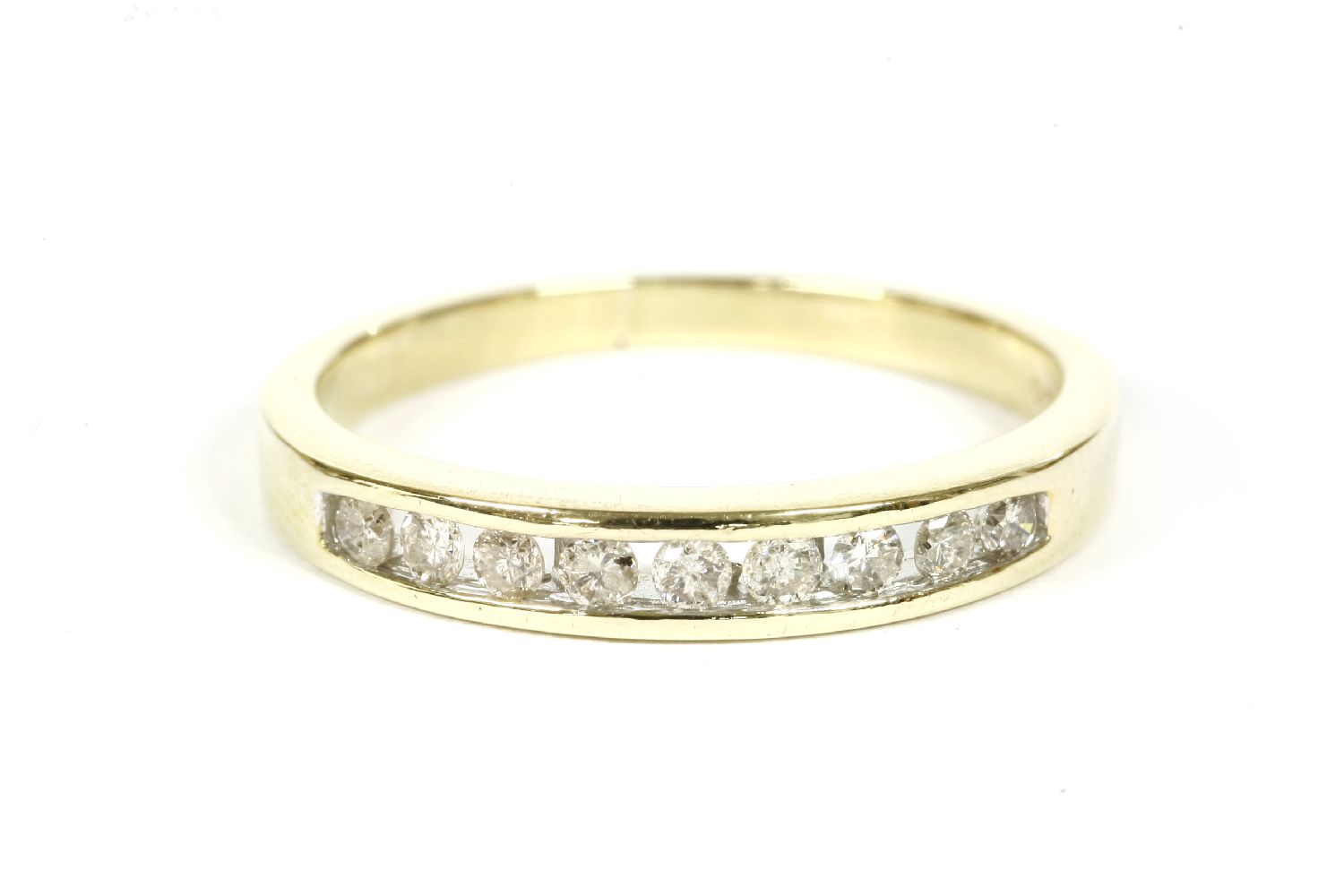 A 9ct gold diamond set half eternity ring, 0.25ct total diamond weight, finger size N½, 2.33g