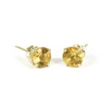 A pair of gold single stone citrine stud earrings, 0.51g