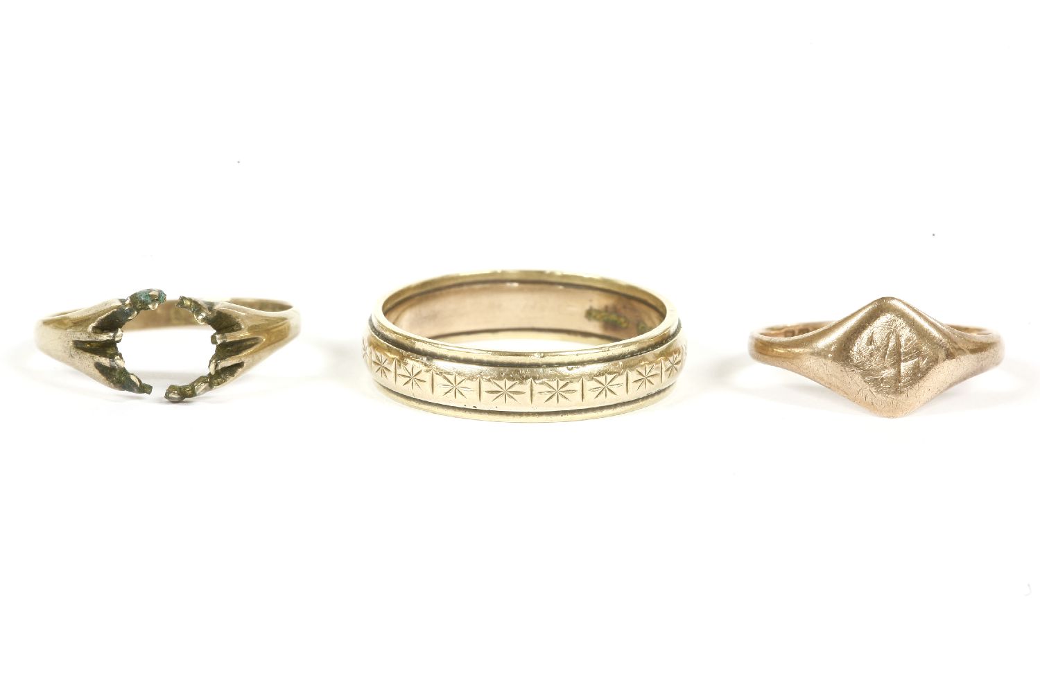 A 9ct gold band ring with diamond cut engraved decoration, a 9ct rose gold signet ring, and a 9ct - Image 2 of 2