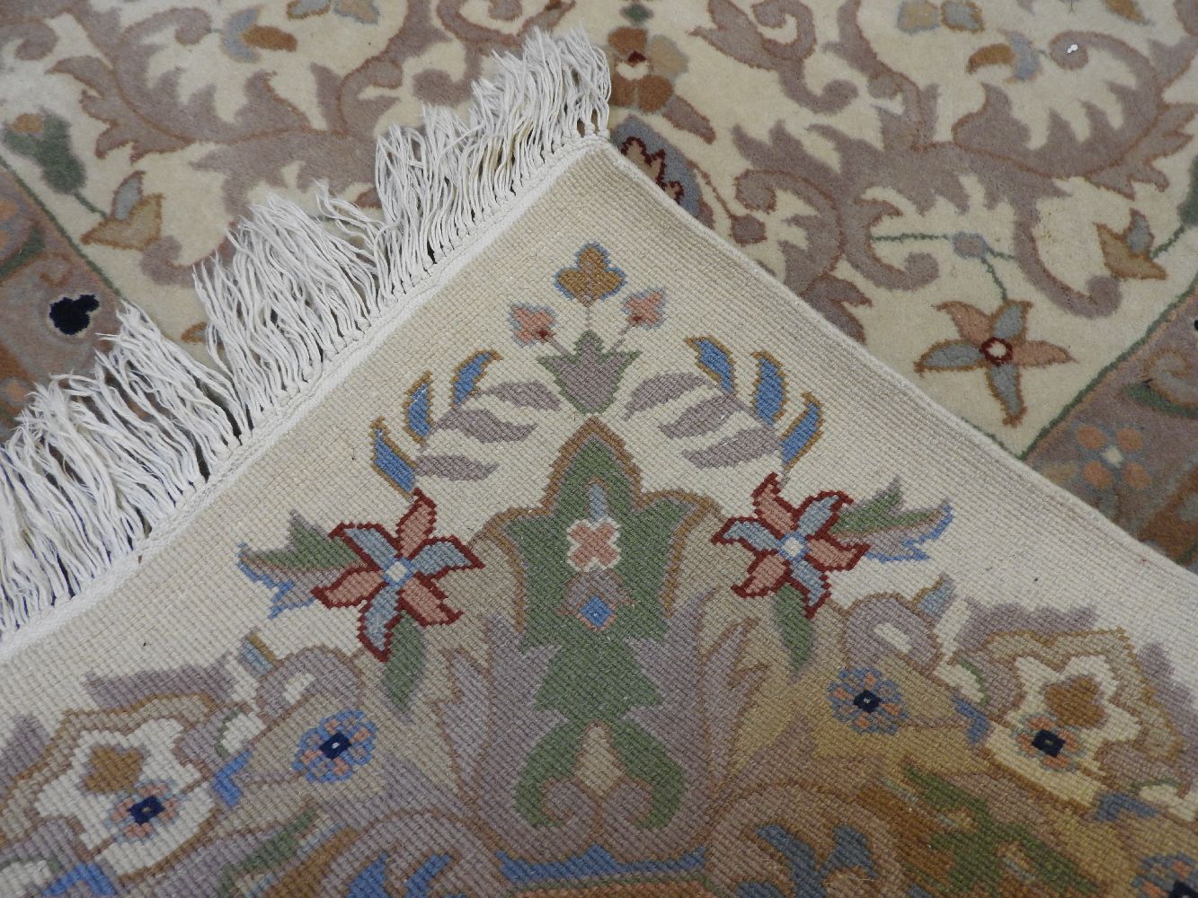 An Indian ivory ground carpet, with central pale blue medallion with conforming border, 364cm x - Image 4 of 4