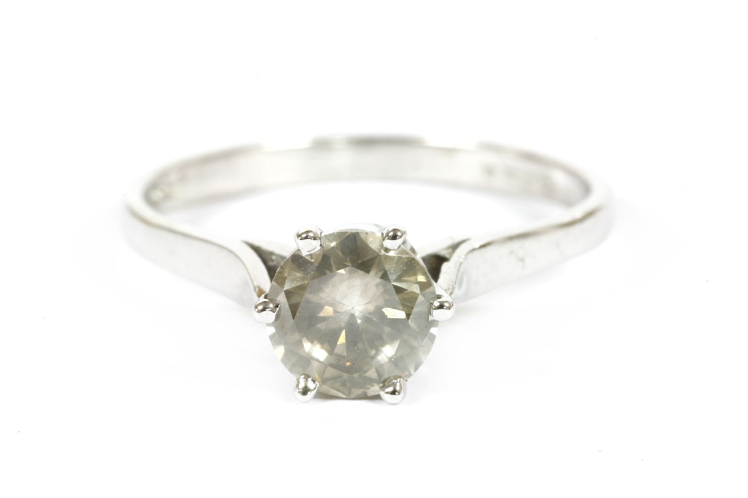 A single stone diamond ring marked 18ct, estimated as approximately 0.85ct, finger size L, 2.22g