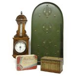 An unusual biscuit tin in the form of a wicker trunk, together with another tin and an Edwardian