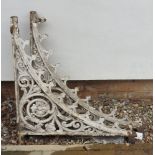 A pair of cast iron brackets,