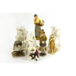 A quantity of various porcelain figures to include a Worcester tramp menu holder, two Worcester