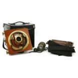 A mahogany plate camera, in case, with accessories