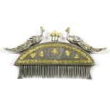 A Mughal style silver and silver gilt beard comb, possibly 18th century, the arched handle