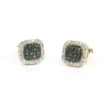 A pair of gold radiated blue diamonds and diamond cushion shaped cluster earrings, marked 375, 1.