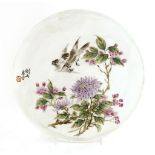 A Chinese famille rose plate, 20th century, painted with two birds above chrysanthemum and other