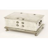 A Thai silver box and hinged cover, late 19th century, of rectangular form with loop handles, on