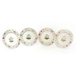 A set of four Chinese famille rose plates,18th century, the centres painted with peach, finger