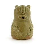 A Chinese Yue ware vessel,Western Jin (266-316), in the form of a bear with moulded facial