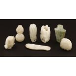 A group of seven pieces of Chinese jades, Qing dynasty (1644-1911), in various shapes comprising: