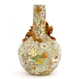 A Chinese famille rose vase,early 20th century, the shoulder with an applied dragon chasing a