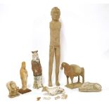 A collection of pottery tomb figures, various dates, comprising:a tall standing man with no arms,