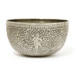 A Thai silver bowl,19th century or later, decorated with dancing figures amongst scrolling leaves,