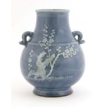 A Chinese lavender blue glazed vase,Qianlong (1736-1795), of baluster form on a circular base,