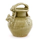 A Chinese Yue ware ewer,Western Jin (266-316), of globular form with moulded chicken head spout, the