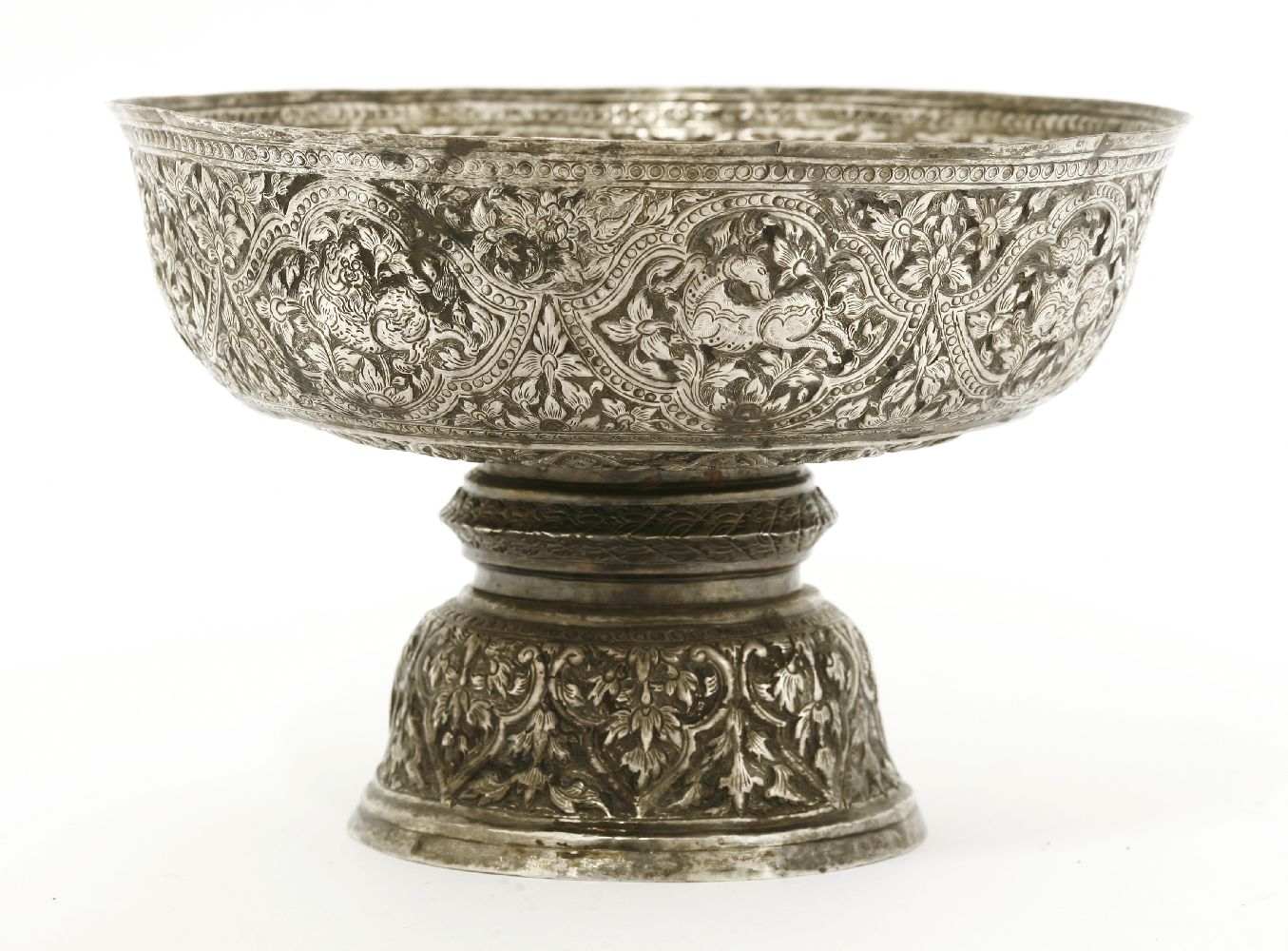 A Vietnamese silver stem bowl,19th century, of circular shape on a pedestal circular foot, decorated