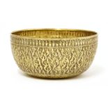 A silver gilt bowl,19th century, of circular form with flat base, the body decorated with stylised