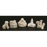 A collection of Chinese blanc de Chine water droppers,18th century, of a Budai, a Buddhist lion, a