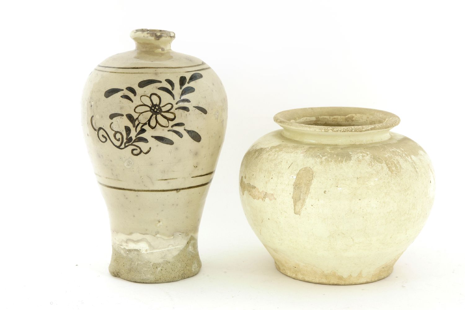 A Chinese pot,Tang dynasty (618-907), of globular form under a white glaze,18cm, anda Cizhou ware