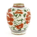 A Chinese wucai pot,17th century, painted with scrolling flowers,12cm high十七世纪 五彩缠枝花卉纹罐