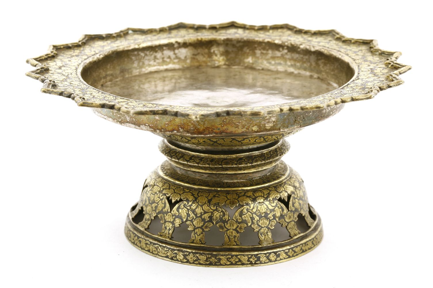 A Thai silver niello gilt plate,19th century, of lobed form engraved with peony, on a pierced