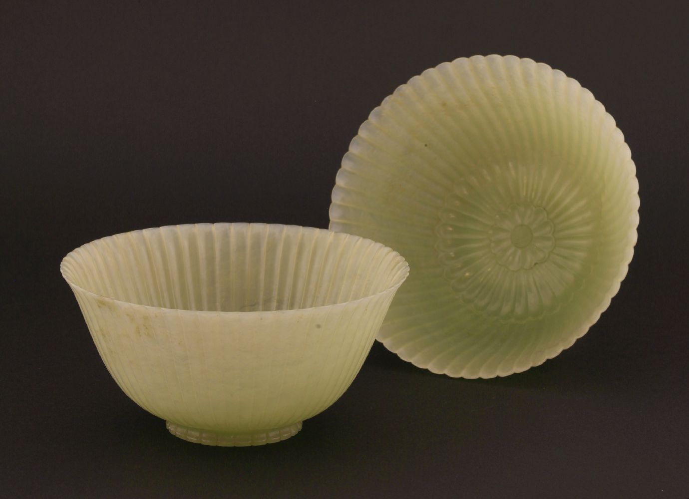 A pair of Chinese pale celadon jade chrysanthemum 'Lindsay' bowls, Jiaqing (1796-1820), each with - Image 13 of 14