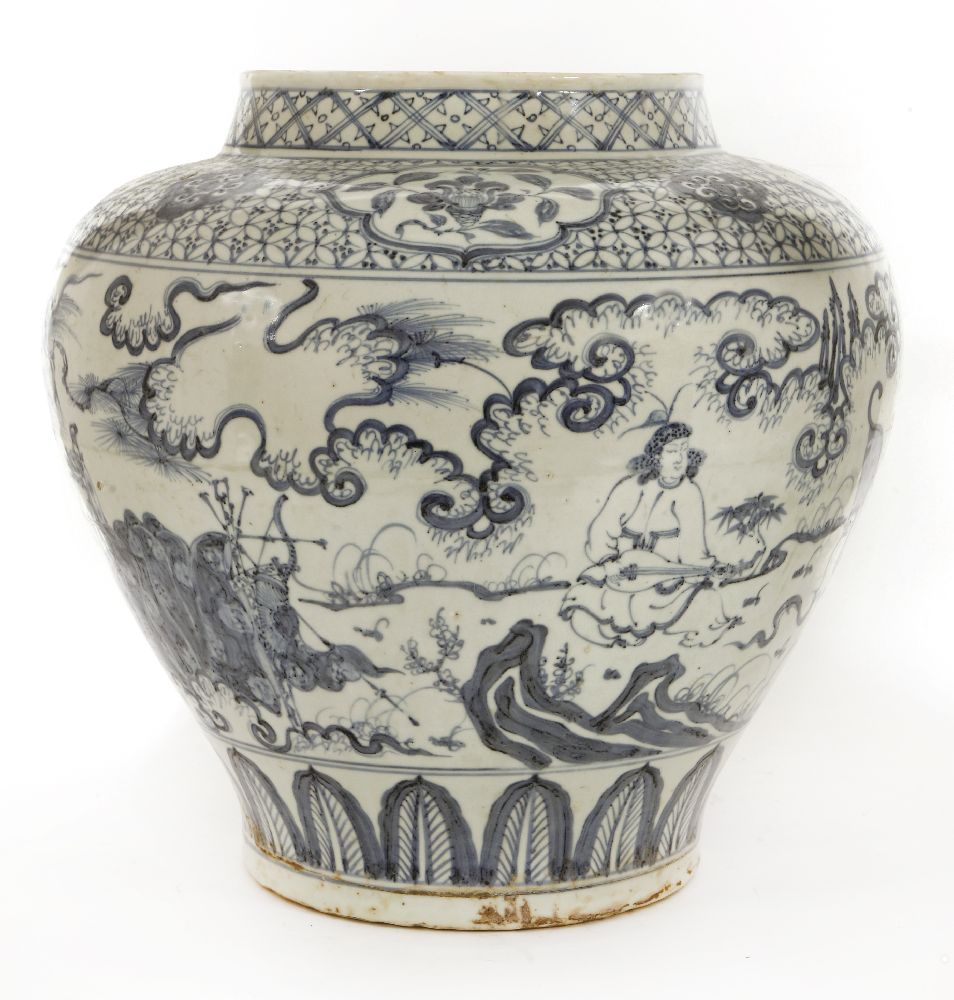 A Chinese blue and white jar,painted with figures listening to music in a garden, between a diapered