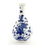 A Chinese blue and white vase,Kangxi (1662-1722), the pear-shaped body with a flared mouth,