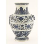 A Chinese blue and white vase, Daoguang (1821-1850), painted with scrolling lotus and flowers