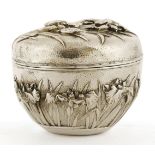 A Japanese silver bowl and cover,c.1900, of circular form in two layers, decorated with irises and