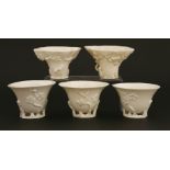 A collection of Chinese blanc de Chine wine cups,18th century, two in the shape of a libation cup,