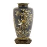 A Japanese cloisonné vase,1930s, with pheasants standing on a blossoming tree between lappet borders