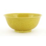 A Chinese yellow-glazed bowl,18th century, of circular form on a circular foot with flared rim,