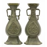 A pair of pewter altar vases,c.1800, each bound in brass and with brass ring handles, the body