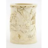 A Japanese ivory tusk vase,Meiji period (1868-1912), deeply carved with the Seven Gods of Fortune in