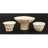 A collection of Chinese blanc de Chine cups,early 18th century, one in the form of a libation cup