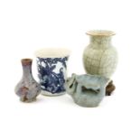 A collection of Chinese ceramics, 20th century, comprising a blue and white brush pot, of