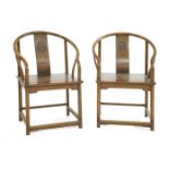 A pair of Chinese armchairs,early 20th century, each of classical form, with an horseshoe back and