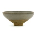 A Chinese Jun ware bowl,Yuan dynasty (1279-1368), the steep rounded sides of almost conical form,