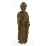 A Korean bronze figure, possibly 18th century or earlier, of Shakyamuni standing with his right hand