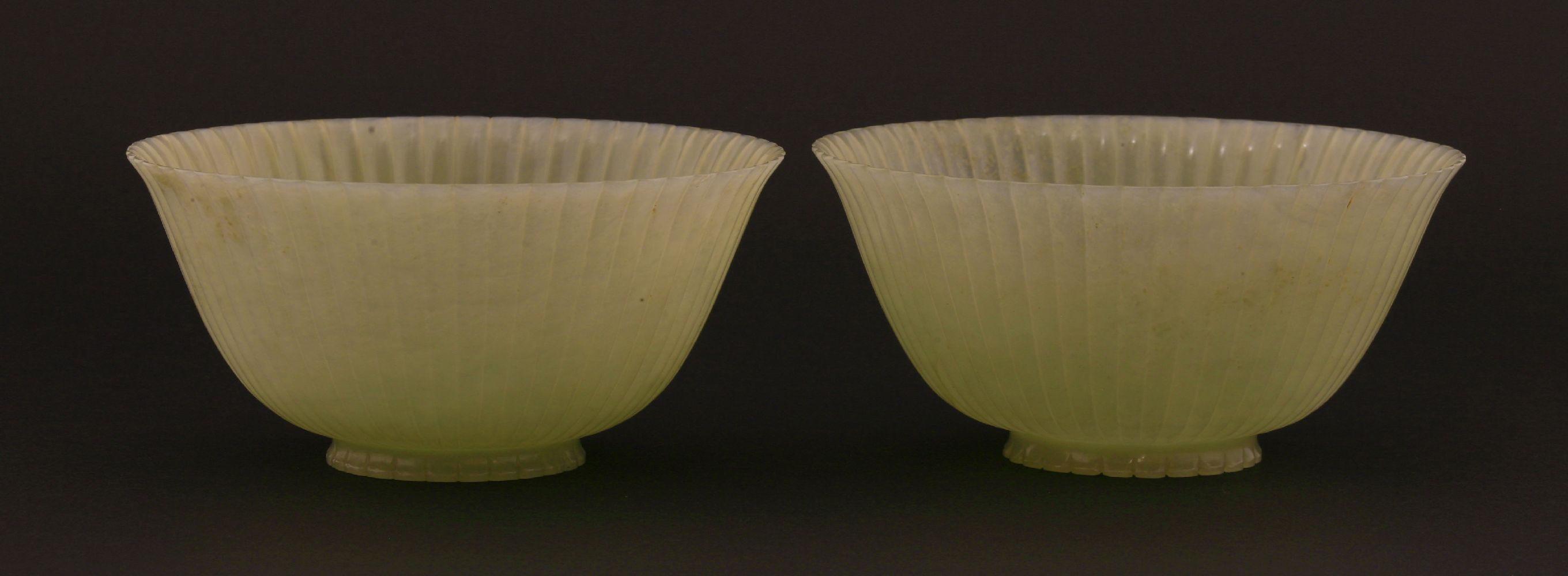 A pair of Chinese pale celadon jade chrysanthemum 'Lindsay' bowls, Jiaqing (1796-1820), each with - Image 10 of 14