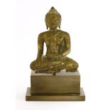 A bronze Buddha,19th century, seated in Bhumisparsa mudra, 13cm, fitted on a block base