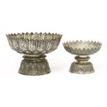 Two silver stem bowls,19th century, each of circular form with a spiky rim, on a circular domed