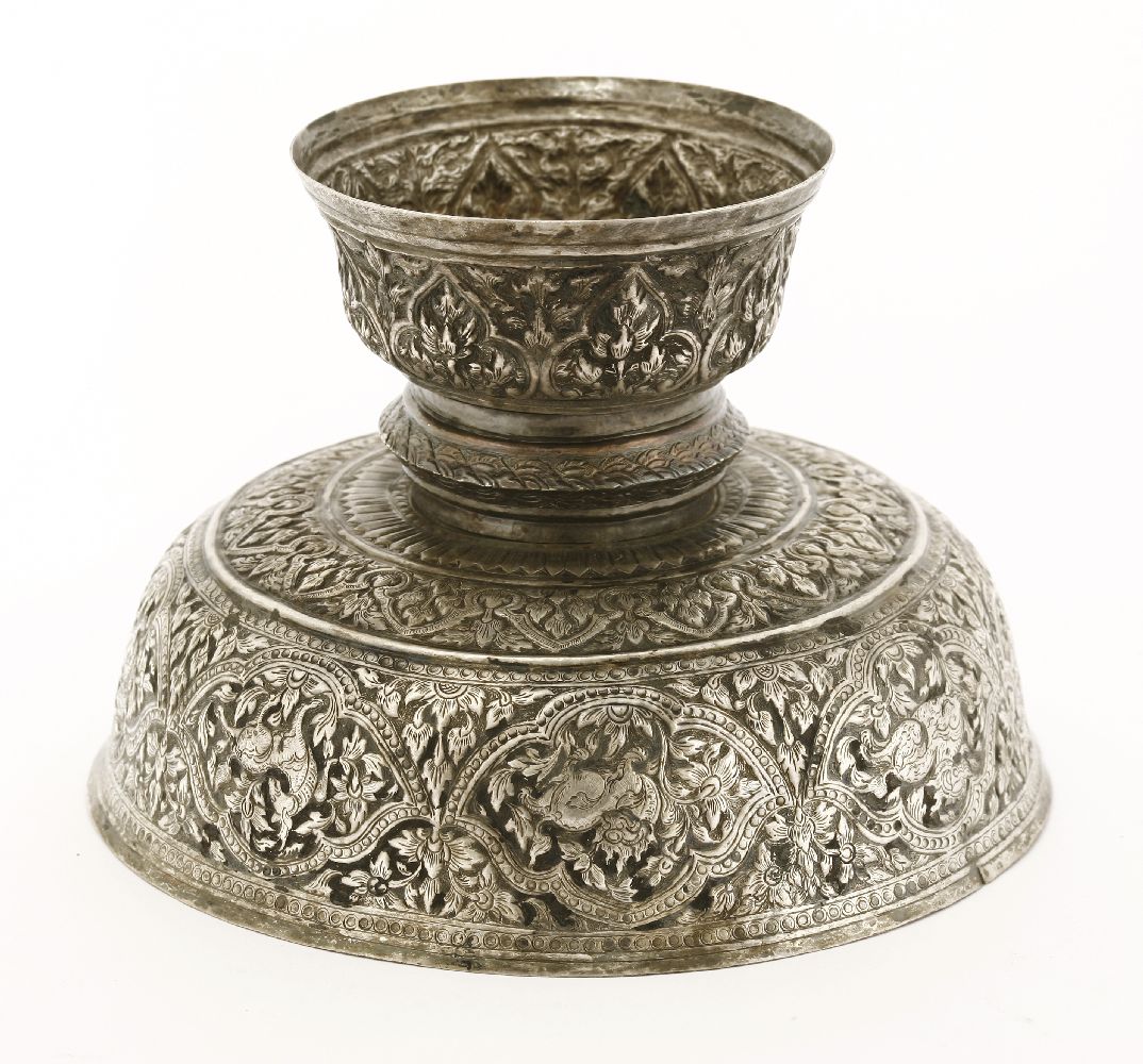 An Indian silver tazza, of circular form on a circular base, the border with impressed deities, - Image 3 of 3