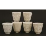 Six Chinese cups,possibly 18th century, of octagonal form, one with lotus petals, two character seal