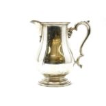 An International sterling Lord Saybrook 4½ inch pitcher, or ale jug, 20th century of baluster